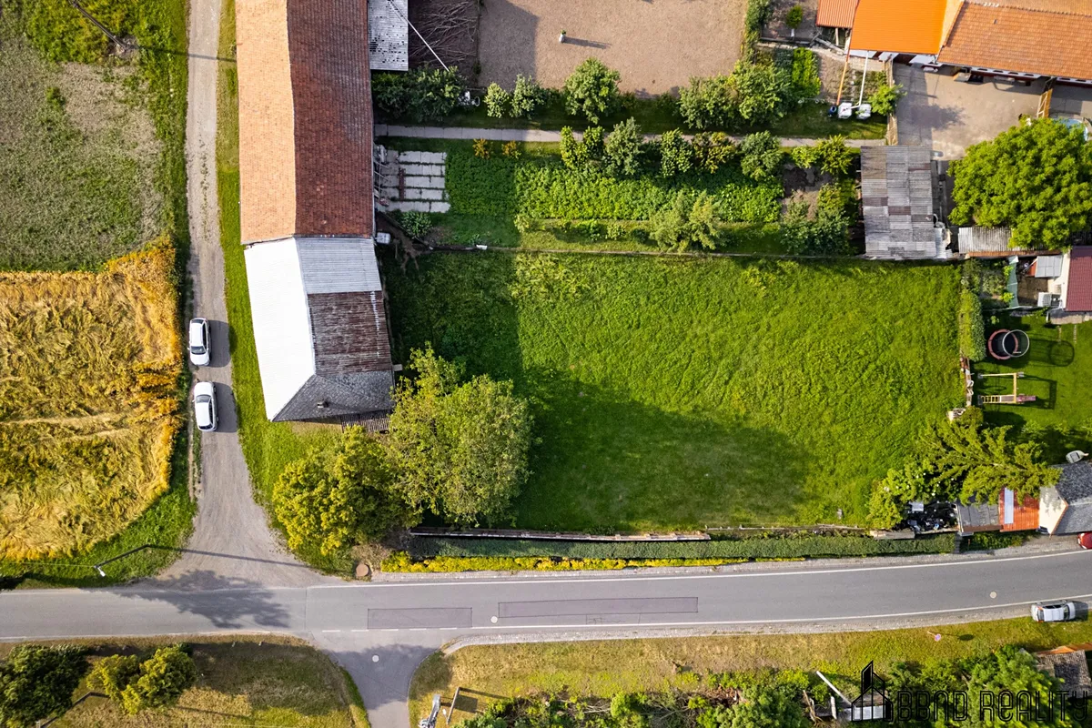 Prodej stavebního pozemku 1853 m² — Biskupice